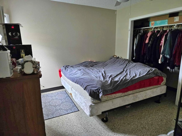607 Riverside Ave, Park Rapids, MN 56470 - bedroom with a closet, speckled floor, and a textured ceiling