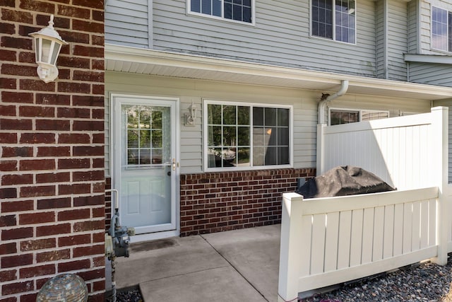 6226 Maclynn Ave NE, Otsego, MN 55301 - property entrance featuring brick siding