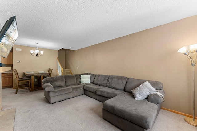 6226 Maclynn Ave NE, Otsego, MN 55301 - living room featuring light colored carpet, a chandelier, stairs, and a textured ceiling