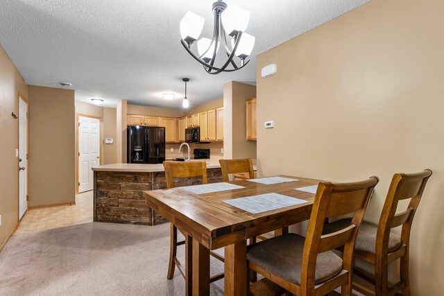 6226 Maclynn Ave NE, Otsego, MN 55301 - dining area with a textured ceiling, a chandelier, and light carpet