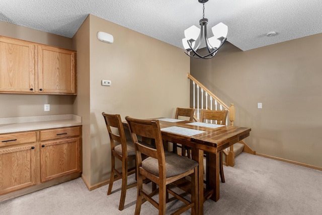6226 Maclynn Ave NE, Otsego, MN 55301 - dining area with light carpet, a chandelier, a textured ceiling, and stairs