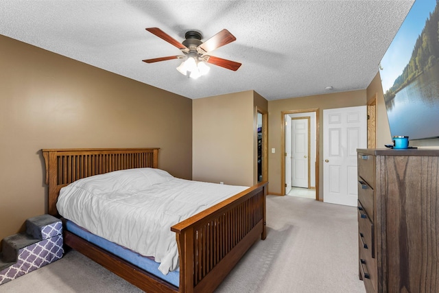 6226 Maclynn Ave NE, Otsego, MN 55301 - bedroom with light carpet, ceiling fan, and a textured ceiling