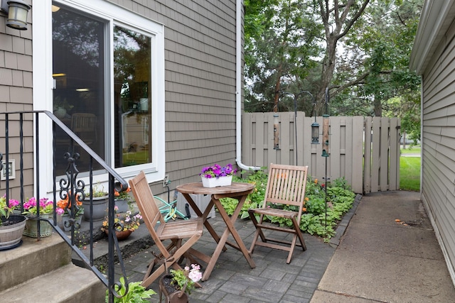 1163 Edgcumbe Rd Unit 1163, Saint Paul, MN 55105 - view of patio / terrace with a gate