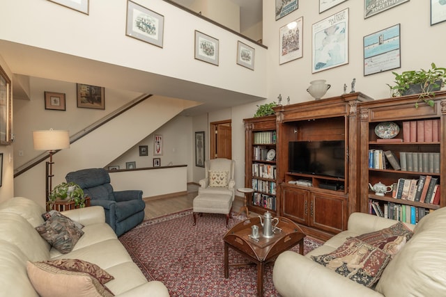 1163 Edgcumbe Rd Unit 1163, Saint Paul, MN 55105 - living room featuring wood finished floors and stairway