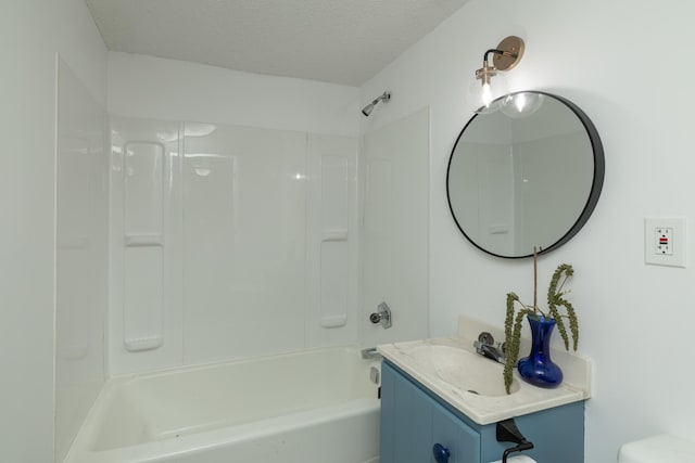 1163 Edgcumbe Rd Unit 1163, Saint Paul, MN 55105 - full bath with vanity, shower / tub combination, and a textured ceiling
