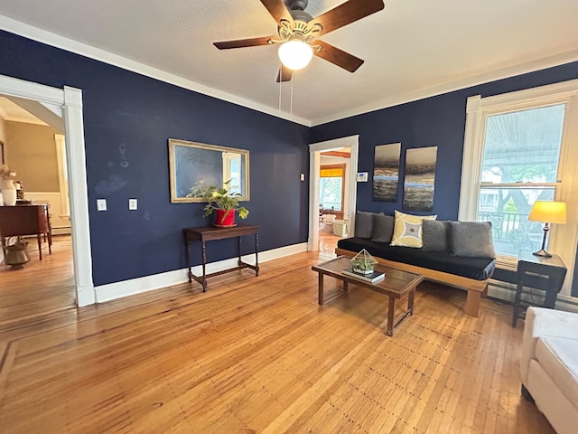 3128 Portland Ave, Minneapolis, MN 55407 - living area featuring ceiling fan, light wood-type flooring, and crown molding