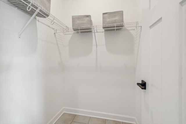 5890 Rathbun Ave NE, Otsego, MN 55374 - walk in closet with light tile patterned floors