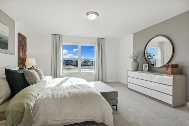 5890 Rathbun Ave NE, Otsego, MN 55374 - bedroom featuring light colored carpet and baseboards