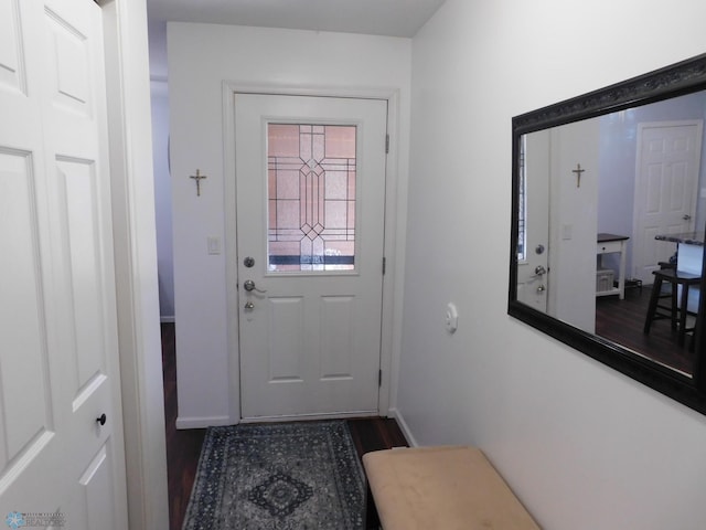 2524 25th Ave S, Fargo, ND 58103 - doorway with dark wood-style floors and baseboards