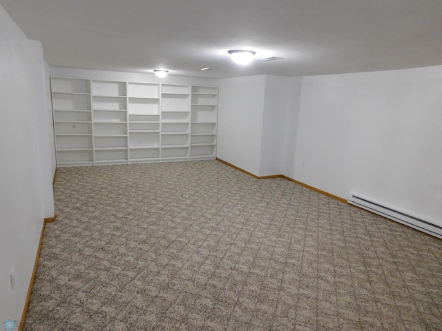 2524 25th Ave S, Fargo, ND 58103 - below grade area featuring carpet floors and baseboard heating