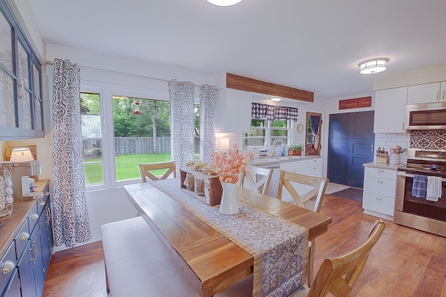 1016 26th Ave N, Saint Cloud, MN 56303 - dining space featuring light wood-style floors