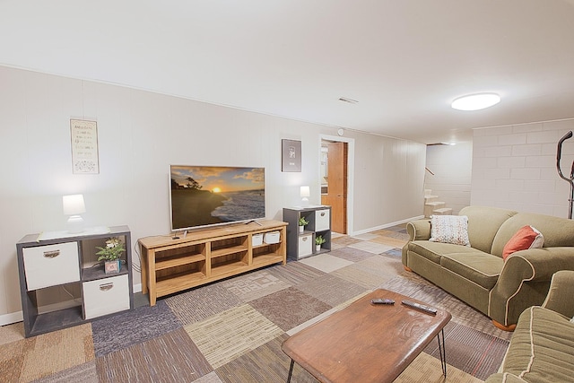 1016 26th Ave N, Saint Cloud, MN 56303 - living room featuring stairway and baseboards