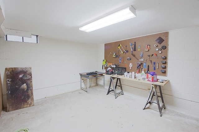 1016 26th Ave N, Saint Cloud, MN 56303 - office space featuring a workshop area, unfinished concrete floors, and concrete block wall