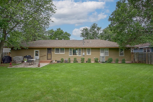 1016 26th Ave N, Saint Cloud, MN 56303 - rear view of house with a patio