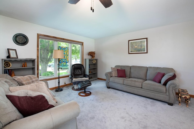 1704 Fair St, Mankato, MN 56001 - carpeted living room with baseboards and a ceiling fan