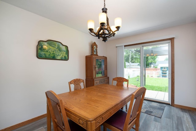 1704 Fair St, Mankato, MN 56001 - dining space with a chandelier and wood finished floors