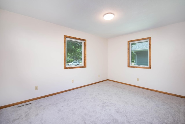 1704 Fair St, Mankato, MN 56001 - carpeted empty room with baseboards