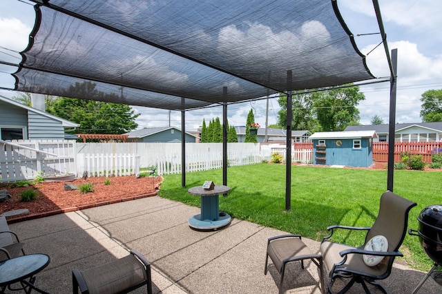1704 Fair St, Mankato, MN 56001 - fenced backyard featuring a patio and a shed