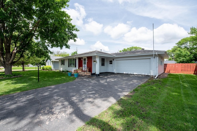 1704 Fair St, Mankato, MN 56001 - ranch-style house with driveway and a garage