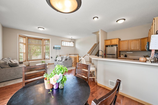 20060 Heritage Dr, Lakeville, MN 55044 - dining room with wood finished floors and baseboards