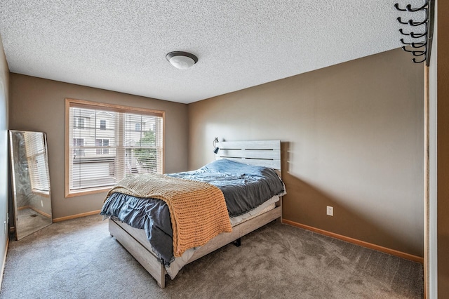 20060 Heritage Dr, Lakeville, MN 55044 - carpeted bedroom with baseboards and a textured ceiling