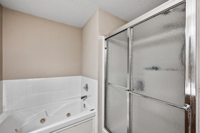 20060 Heritage Dr, Lakeville, MN 55044 - full bath featuring a whirlpool tub, a shower stall, and a textured ceiling