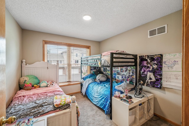20060 Heritage Dr, Lakeville, MN 55044 - carpeted bedroom featuring a textured ceiling and recessed lighting