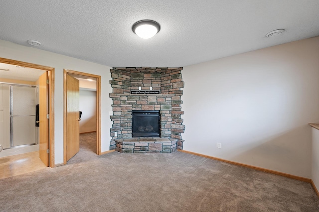 20060 Heritage Dr, Lakeville, MN 55044 - unfurnished living room with carpet flooring, a stone fireplace, and a textured ceiling