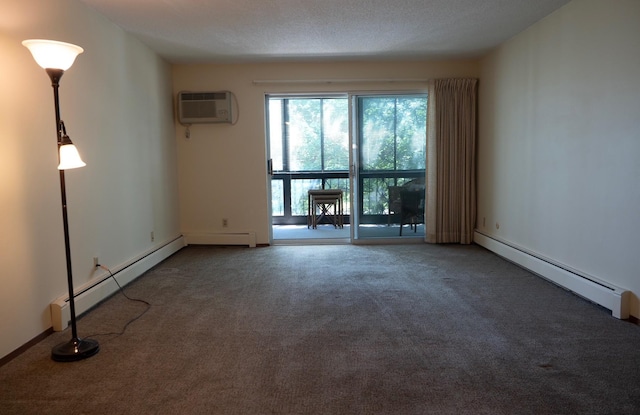 2720 Dale St N Unit C206, Roseville, MN 55113 - carpeted spare room featuring baseboard heating, a wall unit AC, and a baseboard radiator