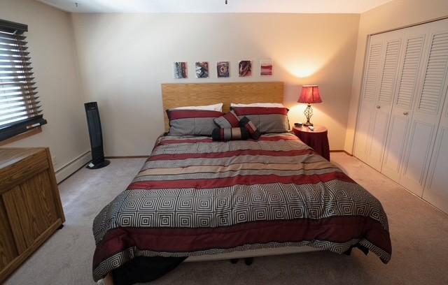 2720 Dale St N Unit C206, Roseville, MN 55113 - carpeted bedroom featuring a closet