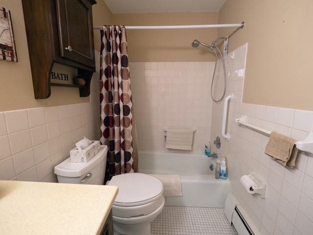 2720 Dale St N Unit C206, Roseville, MN 55113 - full bathroom featuring tile walls, vanity, shower / bath combo, tile patterned flooring, and a wainscoted wall