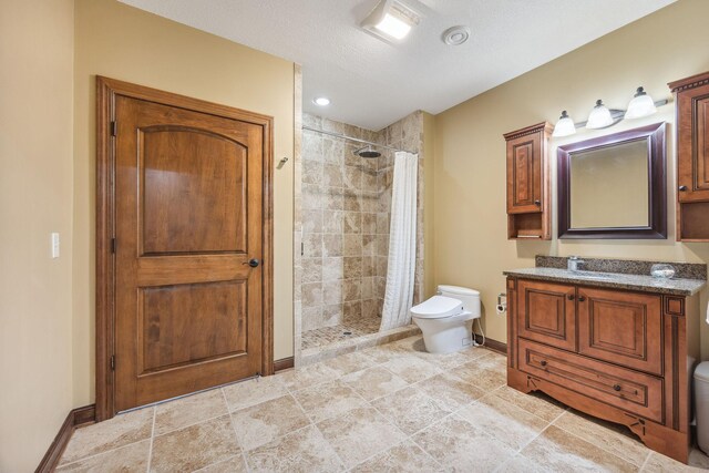 18658 Ponderosa Ct, Eden Prairie, MN 55347 - bathroom featuring a tile shower and vanity