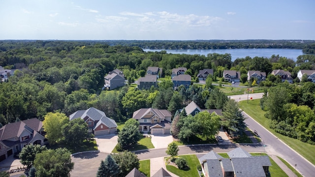 18658 Ponderosa Ct, Eden Prairie, MN 55347 - aerial view of residential area with a nearby body of water and a heavily wooded area