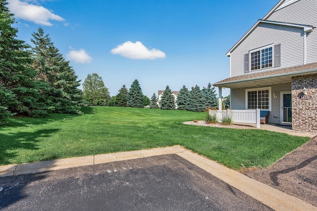 14220 Avalon Path Unit 1102, Rosemount, MN 55068 - view of green lawn with covered porch