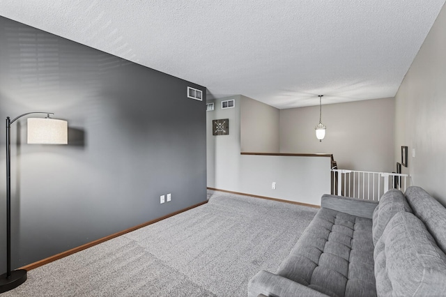 14220 Avalon Path Unit 1102, Rosemount, MN 55068 - carpeted living room with a textured ceiling and baseboards
