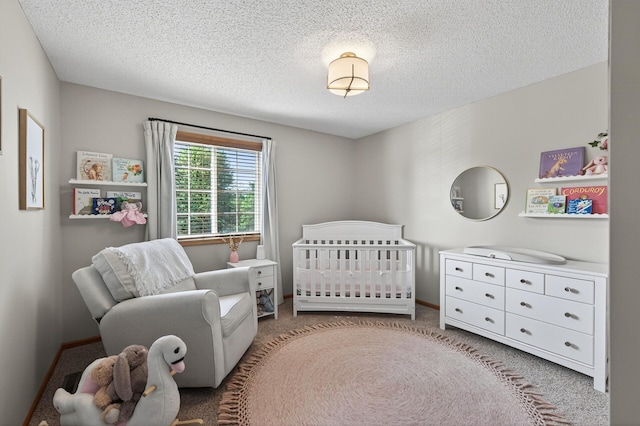 14220 Avalon Path Unit 1102, Rosemount, MN 55068 - bedroom with a nursery area, carpet flooring, and a textured ceiling