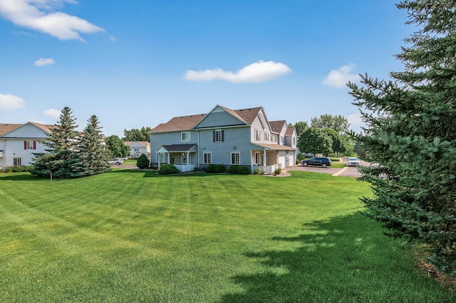 14220 Avalon Path Unit 1102, Rosemount, MN 55068 - back of property featuring a yard and driveway