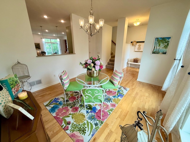 8124 Oakview Ln N Unit 47, Maple Grove, MN 55369 - dining space featuring stairs, wood finished floors, a chandelier, and recessed lighting