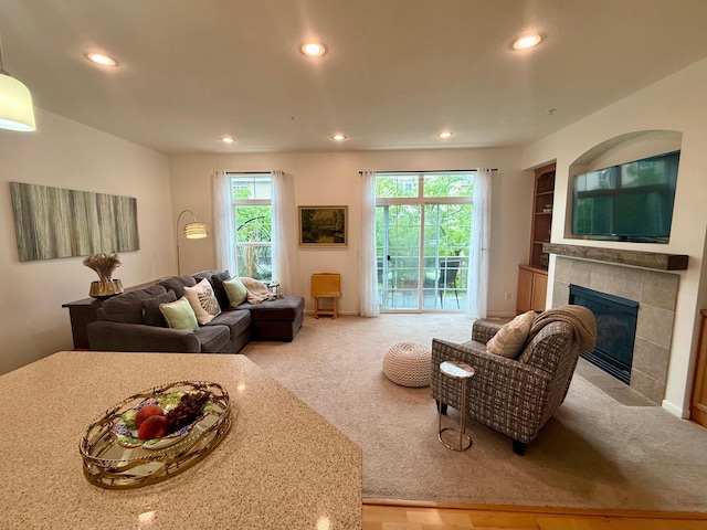 8124 Oakview Ln N Unit 47, Maple Grove, MN 55369 - living room with a tiled fireplace, recessed lighting, and carpet