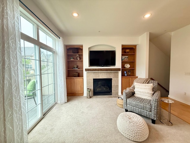8124 Oakview Ln N Unit 47, Maple Grove, MN 55369 - sitting room with recessed lighting, a fireplace, built in features, and carpet
