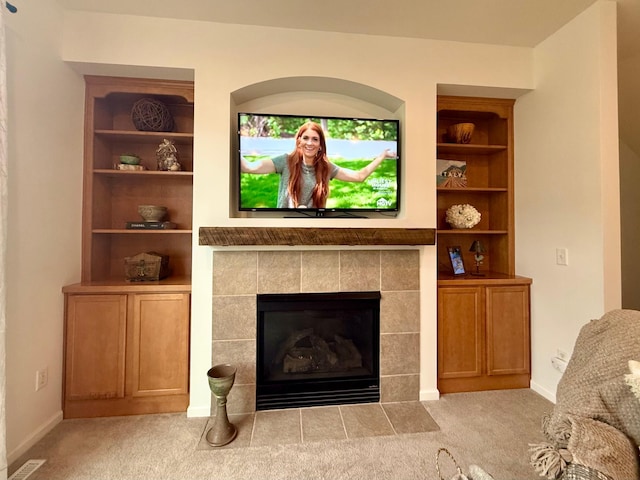 8124 Oakview Ln N Unit 47, Maple Grove, MN 55369 - carpeted living room with a fireplace and built in features