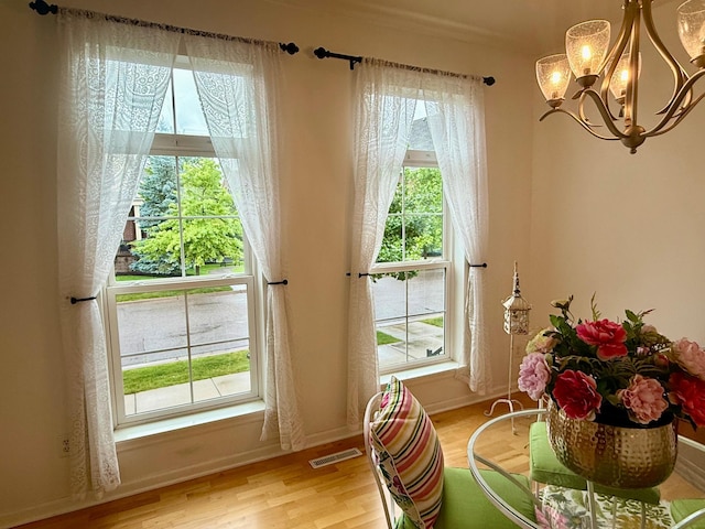 8124 Oakview Ln N Unit 47, Maple Grove, MN 55369 - dining room with a chandelier and light wood-style floors