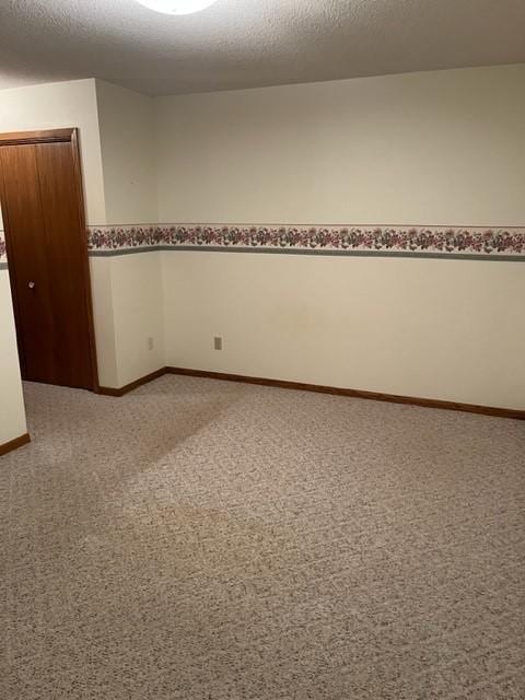 324 7th St, Windom, MN 56101 - unfurnished room featuring carpet floors and baseboards