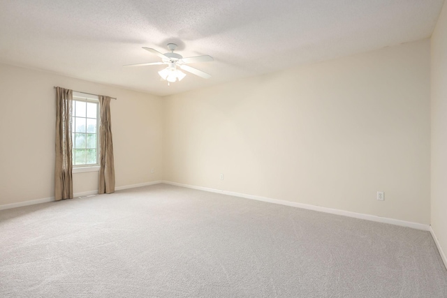 12344 67th St NE, Otsego, MN 55330 - unfurnished room featuring ceiling fan, light colored carpet, and a textured ceiling