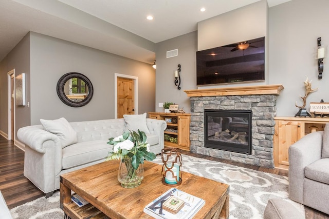 29680 Hidden Forest Blvd, Chisago City, MN 55013 - living area featuring wood finished floors, recessed lighting, and a stone fireplace