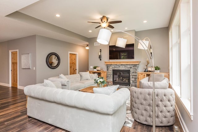 29680 Hidden Forest Blvd, Chisago City, MN 55013 - living room featuring dark wood-style flooring, ceiling fan, a fireplace, healthy amount of natural light, and recessed lighting