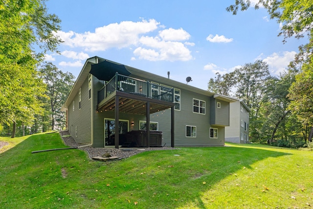 29680 Hidden Forest Blvd, Chisago City, MN 55013 - rear view of property with a hot tub, a lawn, and a wooden deck