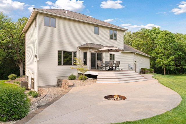 4584 162nd Ln NW, Andover, MN 55304 - back of house featuring an outdoor fire pit, a patio, a lawn, and outdoor dining space