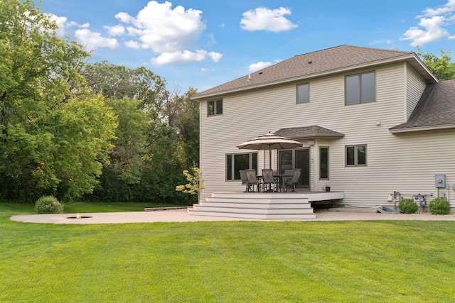 4584 162nd Ln NW, Andover, MN 55304 - back of house with roof with shingles, a patio, and a yard