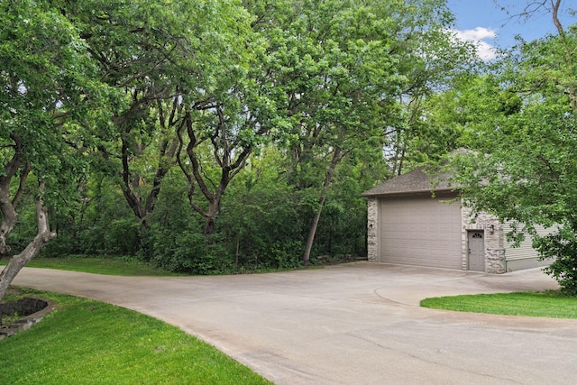 4584 162nd Ln NW, Andover, MN 55304 - garage featuring concrete driveway